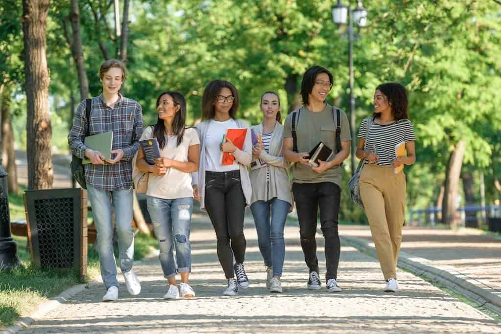 Students Walking and Talking about Educational Tax Benefits